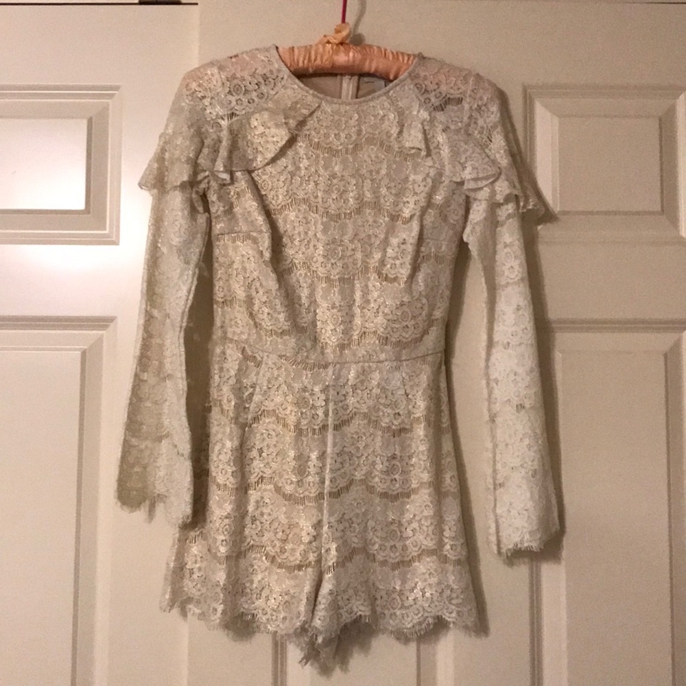 White & gold long sleeve romper